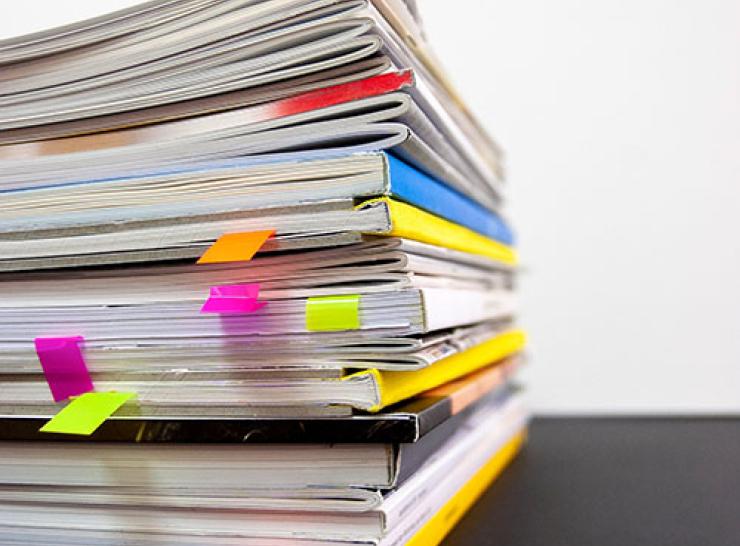 A stack of printed reports